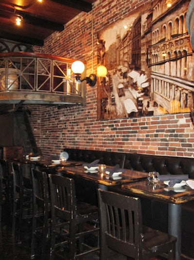 Exposed beams, brick walls, and vintage Boston photography dot the space.