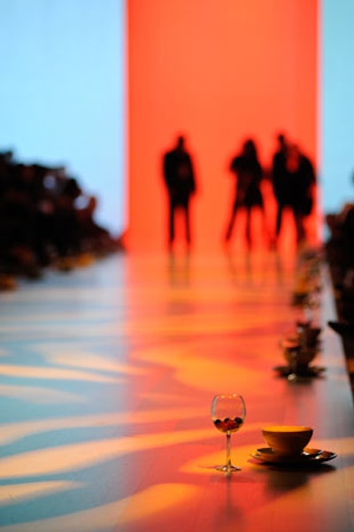 Wine glasses and white dishes dotted the runway for a presentation by the Ryerson University School of Fashion.