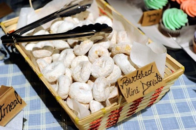 A bake sale included raisin-butter tarts, cupcakes, vanilla frosted cookies, and homemade biscotti.