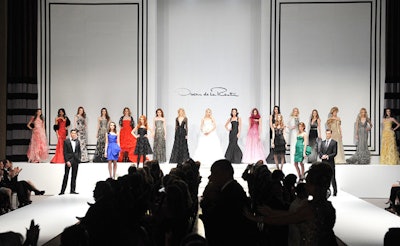 The set design for the runway show complemented the Art Moderne architecture in the Carlu's Concert Hall and provided an elegant setting for Oscar de la Renta's fall 2010 collection.