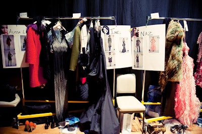 Backstage, each model had a designated clothing rack with pieces from Oscar de la Renta's fall 2010 collection.