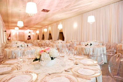 Event designer Jeffry Roick of McNabb Roick Events collaborated with Suzanne Rogers on the decor for the dining area, in the Carlu's Grand Foyer. The pair selected a subdued palette of cream and gold to complement the vibrant runway show.