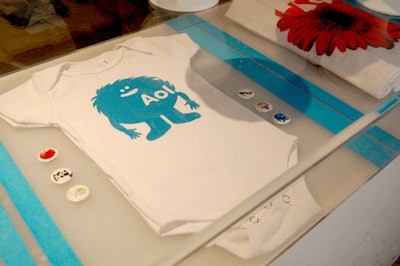 Branded swag, like AOL baby clothes, were on display.