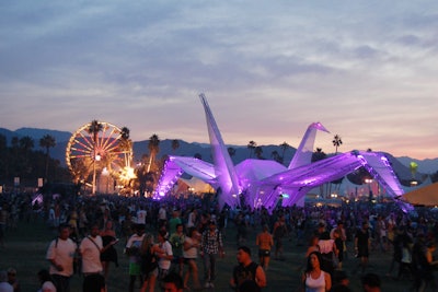 Art installations included a large color-changing crane, evocative of oragami, and a Ferris wheel that supplied festival views.
