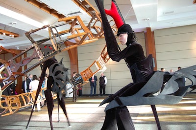 Discarded furniture formed Marc Andre Robinson's sculpture in the center of the cocktail space, providing a focal point for the performers from the Alice Farley Dance Theater.