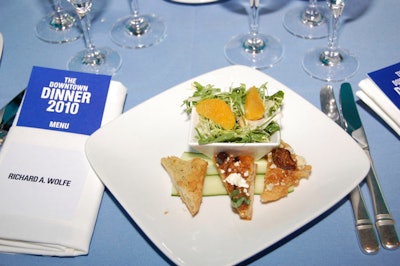 A blue palette decorated the simple dining space, keeping the focus on the night's honorees.
