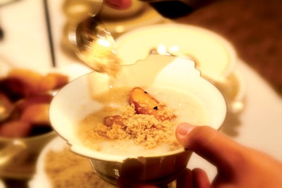 Oatmeal station with caramelized apples, dried fruit compote, golden raisins, brown sugar, and cinnamon-almond preserves from Montage Beverly Hills.