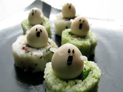 Quail egg-topped sushi.