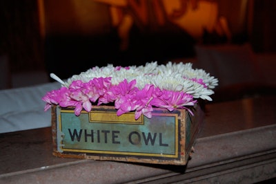 AOM used old cigar boxes as vases for the floral arrangements in the Havana-style lounge space at the Dupont Building.