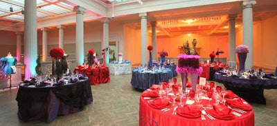 Evening gowns were displayed on dress forms in the Bridge to fit the room's fashion theme. Each table was unique, as if designed by contestants for a Project Runway challenge.