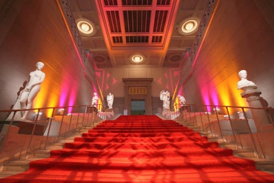 An orange carpet covered the Corcoran's main staircase, while pink and orange lighting kept with the spring theme.