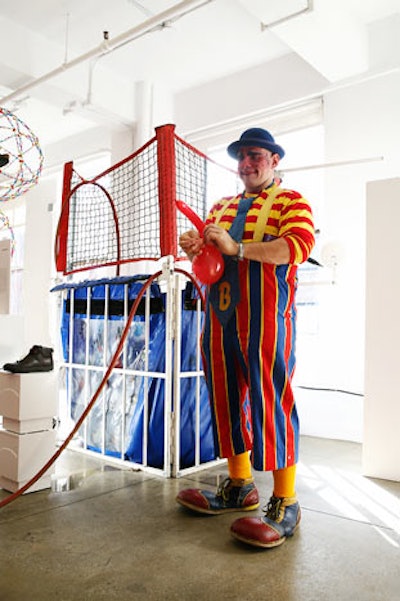 A professional clown from Aardvark Amusements kept the tone light and made balloon sculptures for guests as parting gifts.