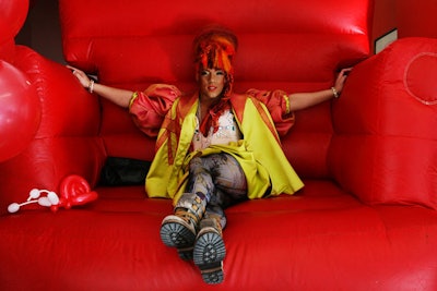 As a whimsical take on the company's selection of unisex shoes, legendary drag queen Erickatoure Aviance (a friend of the brand's publicist) sat on an oversize inflatable chair from Aardvark Amusements, showing that many things, including footwear, sometimes go both ways.