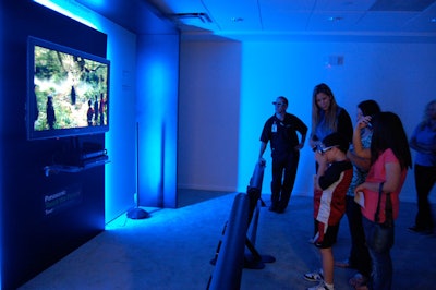 The company created a 3-D home theater space for guests to get a feel of what the system would be like in their home.