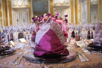 'Prima donna'-folded purple dupioni napkins trimmed in lavender silk accented the Salon Doré's regal look.