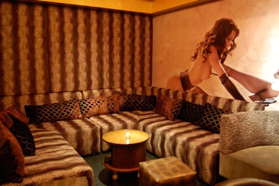 The V.I.P. room is outfitted with animal print seating on one side and four club chairs on the other.