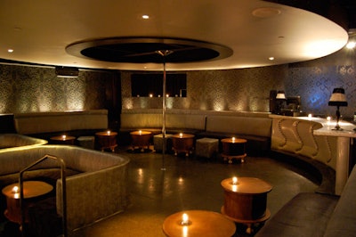The gray and black lounge, which offers a direct view of the stage, can be sectioned off with velvet ropes for V.I.P.s or semiprivate events.