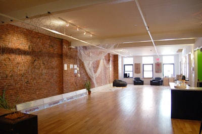 Outfitted with a rotating exhibition of sustainable artwork and vintage furniture, SalonEco can hold cocktail receptions for 125 or smaller seated events.