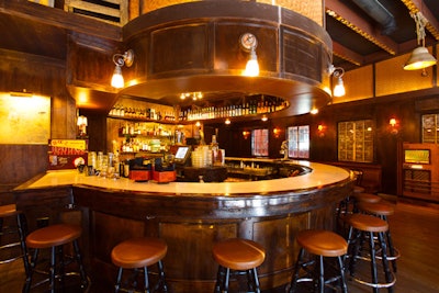 A curvilinear bar offers unfussy bourbon drinks, as well as classic cocktails.
