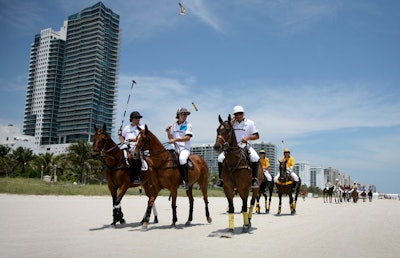 The men's tournament kicked off on Friday after the annual pony parade down the beach.