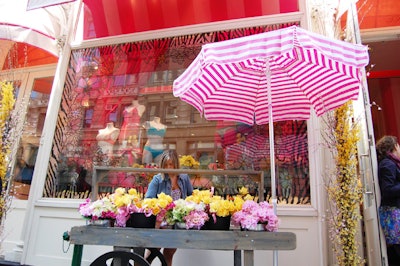 To draw attention from passersby, the models and Victoria's Secret Beauty staffers handed out bouquets from a flower cart outside the store.