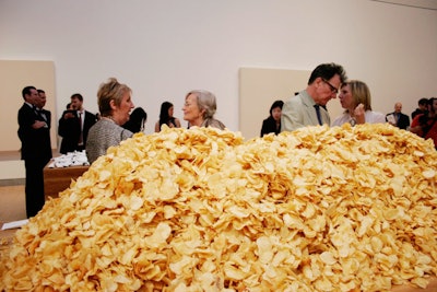 Piles of chips let guests seek out toppings on an adjacent table.