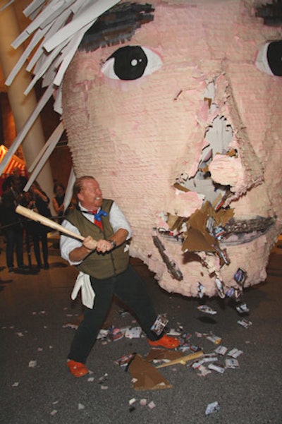 Guests battered the massive Andy Warhol pinata at the end of the night to get to hundreds of Hostess dessert cakes.