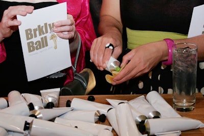 Guests squeezed unmarked paint tubes filled with dips like orange-chipotle mayonnaise onto the potato chips.