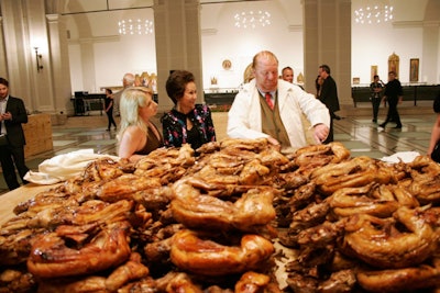 Brooklyn Ball co-chair Mario Batali carved roast rabbits for the first guests.