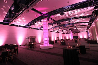 The atrium ballroom, awash in pink, was the main cocktail and dining area.