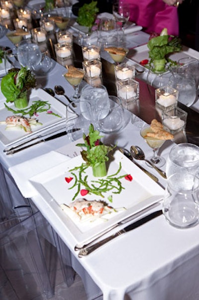 For the first course, Jewell Events Catering prepared lobster remoulade with a cucumber collar, asparagus, pomegranate seeds, and an edible red rose.