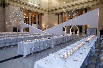 White fabric sculptures formed a barrier between the cocktail area and the dinner tables.