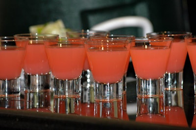 Servers passed fruity pink cocktails while guests bid on silent auction items.