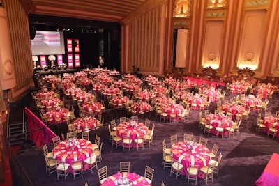 Temporary flooring covered the seats in the opera house's auditorium, where almost 900 guests sat to dinner. Headline act Martin Short performed onstage.