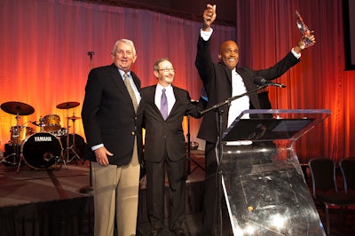 Huntington Theatre Company chairman David Wimberly and managing director Michael Maso presented the Wimberly Award, the Huntington's highest honor, to Broadway director Kenny Leon.