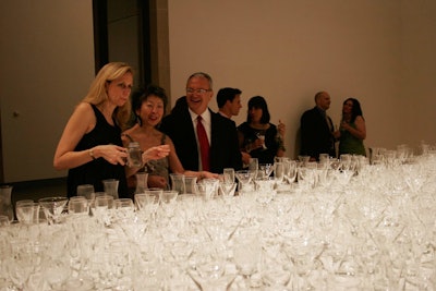 Upon entering the cocktail area, guests found a table with hundreds of different glasses to pick from.