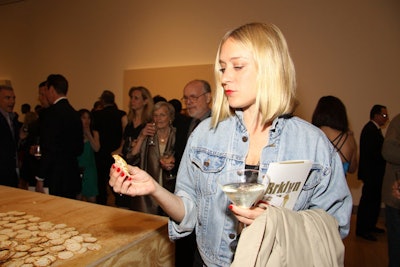 Guest Chloe Sevigny tried a cracker covered in cheese from the melting heads above.