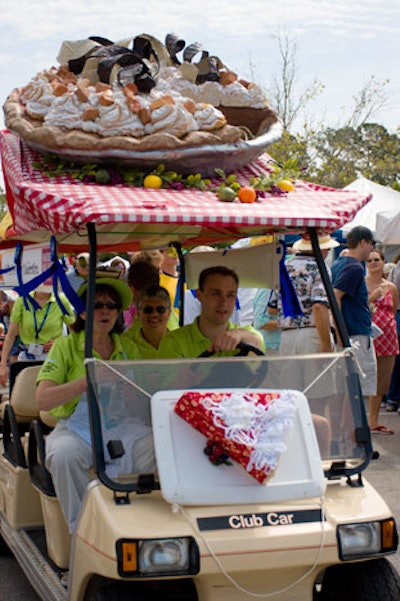 A golf cart with a giant pie on its roof, dubbed the Pietopia cart, carried volunteers and event staffers around the festival grounds.