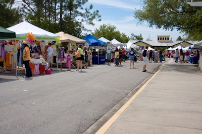 About 24 merchandise and food vendors lined the main street of the festival grounds.