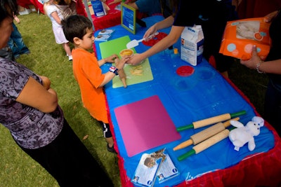 Children who stopped by the Crisco Kids Creation Station rolled and decorated chunks of pie dough for them to take home in a box.