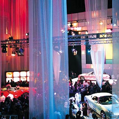 For the Ford Thunderbird event at the Hammerstein Ballroom, Bernhard-Link projected a rainbow of dazzling colors onto sheer white curtains.