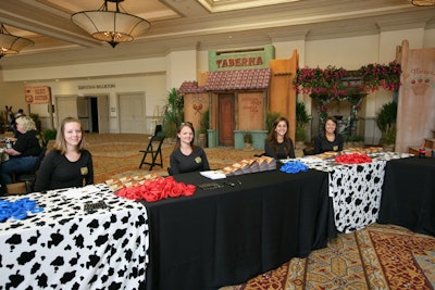 Cow-print linens draped the check-in tables.