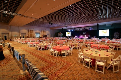 Wooden fencing separated the 75 dinner tables from the entertainment half of the ballroom.