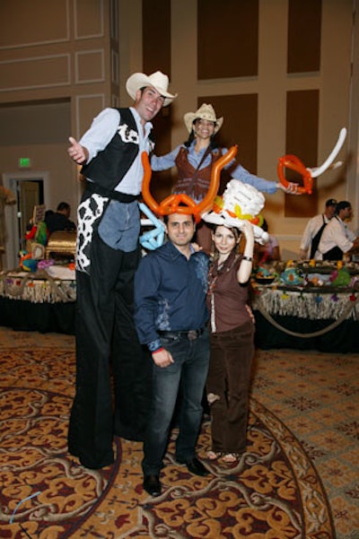 Entertainers and guests dressed in western-style costumes for the event.