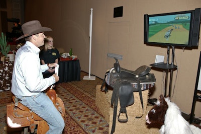 A video game station with a bull-roping challenge was one of multiple western games for guests to play.