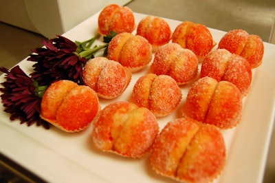 Sponge cakes with custard filling, created by A La Carte Kitchen, were designed to look like sugar bottoms and colour coordinated to match the fund-raiser's signature hue.