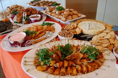 Food stations included an assortment of cheeses served with gourmet crackers, stuffed grape leaves, roasted potato wedges with saffron dressing, pakoras, vegetable dumplings, and samosas.