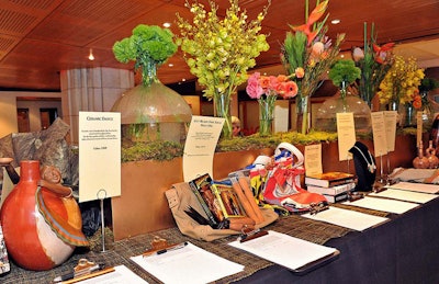 The silent auction area, decorated with South American flowers, wasn't your run of the mill beauty baskets and handbags, but had textiles and crafts of Peru, many with carefully detailed descriptions that made elevated the perfunctory.