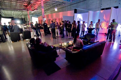 At the center of the space, 'everyone came together and had a party' replete with music, lounge furniture, and illuminated mannequins, according to event designer Clint Paton.