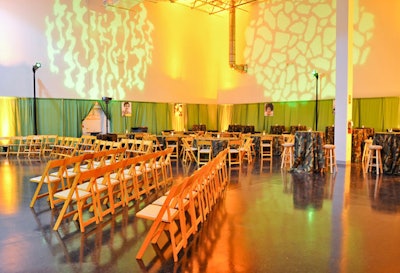 Panache used camouflage linens, wood folding chairs and green draping to decorate the Base Camp event area.